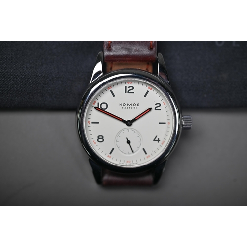 254 - A Nomos Club wristwatch - model 3564 with leather strap, boxed with documents, 2018