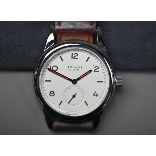 254 - A Nomos Club wristwatch - model 3564 with leather strap, boxed with documents, 2018