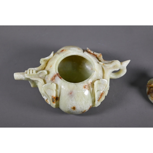 562 - A green hardstone (possibly onyx) naturalistic design teapot and cover, green with russet inclusions... 