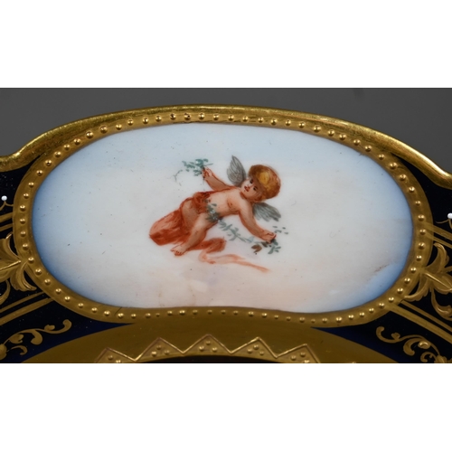 663 - A Vienna porcelain cabinet plate, painted with 'Girl with a Candle' after Georges de la Tour, signed... 