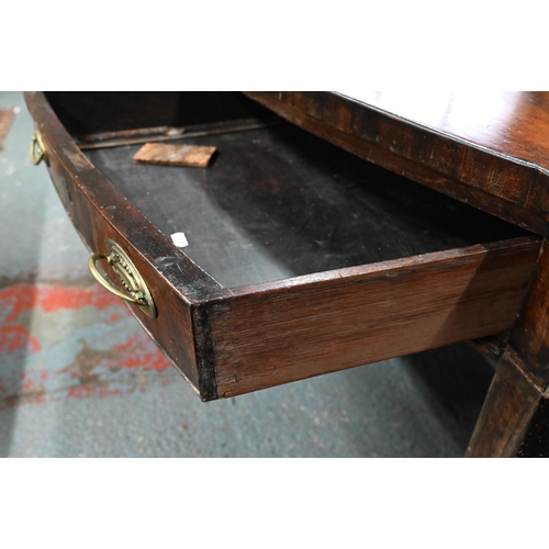 935 - A Victorian mahogany bow-fronted sideboard with three drawers, raised on square tapering legs to spa... 