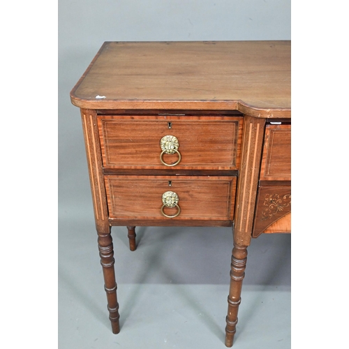 985 - A late 19th century Sheraton design mahogany breakfront sideboard, with an arrangement of six drawer... 