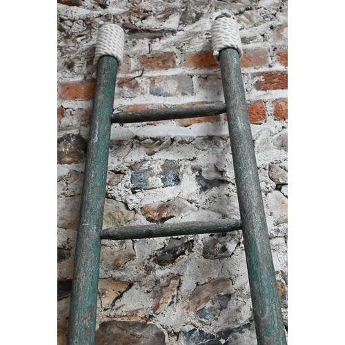 1032 - A vintage distress paint finished ladder, 262 cm long x 36 cm w