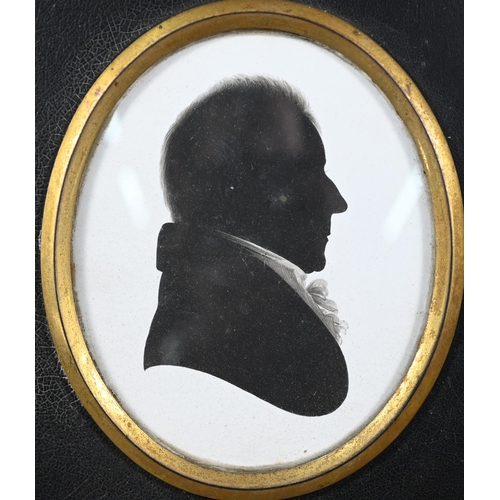 1141 - A Regency silhouette of a gentleman, by Miers & Field, 111 The Strand, London, 8 x 6.5 cm, in eb... 