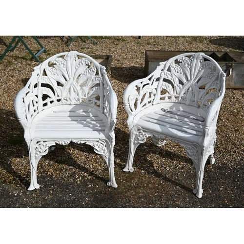 A pair of Victorian style cast metal garden chairs in the Coalbrookdale manner, with wood slat seats  (2)