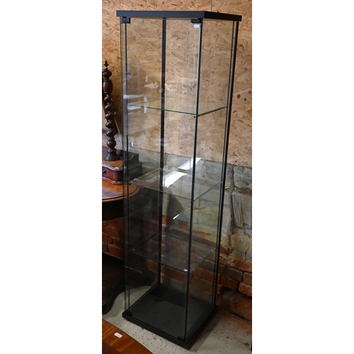 518 - A modern glass tower display cabinet