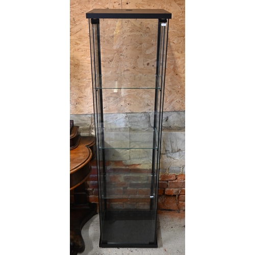 518 - A modern glass tower display cabinet