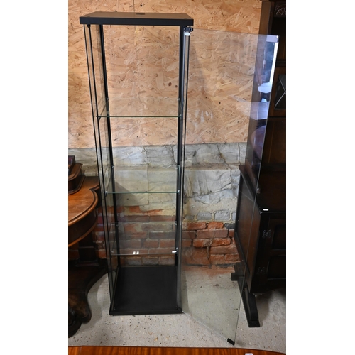 518 - A modern glass tower display cabinet