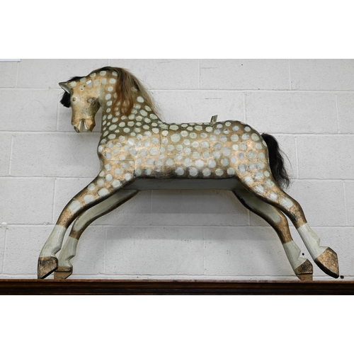 531 - A gilt and cream painted wooden rocking horse (lacks rockers)