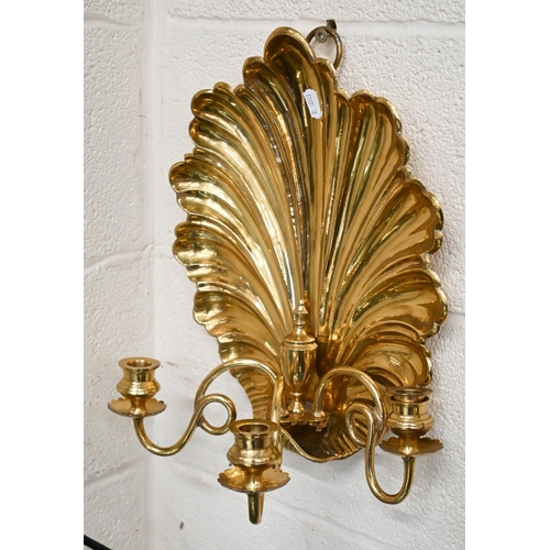 536 - A pair of three-branch brass 'shell' wall sconces