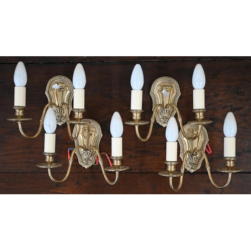 537 - Four brass twin-branch wall sconces with beaded wall plates