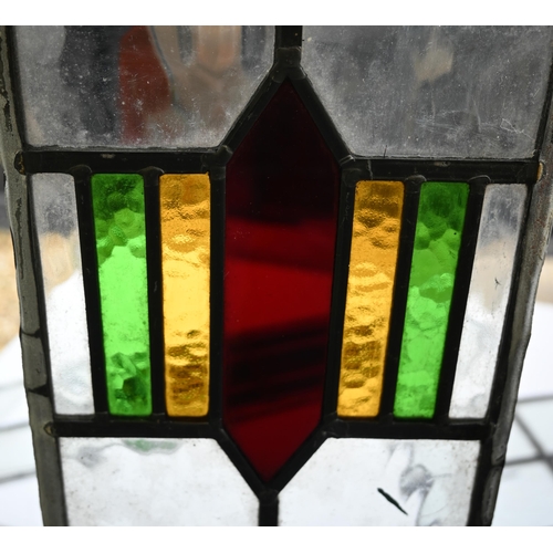 540 - # A rectangular leaded stained glass window 112 cm x 70 cm to/w two conforming smaller examples (dam... 