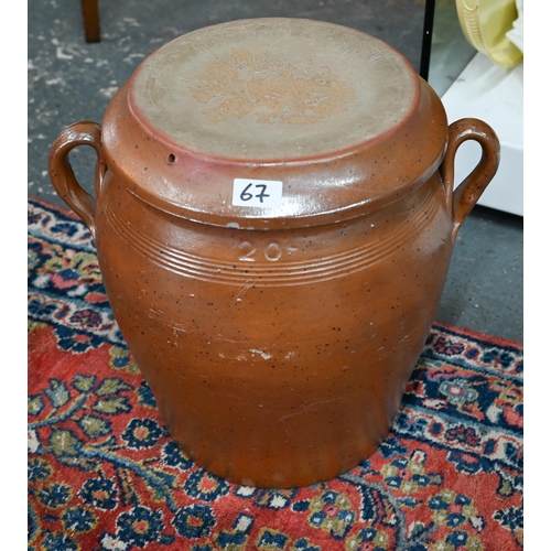 67 - A large vintage glazed stoneware crock and cover/stand, 40 cm high