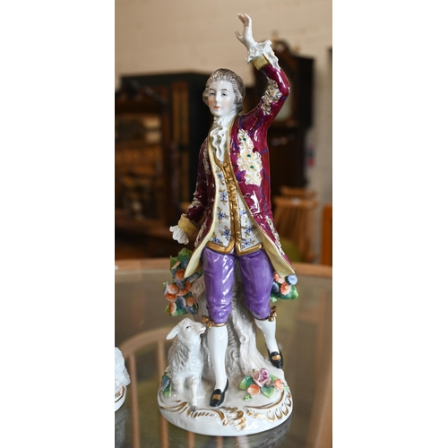 70 - A pair of Sitzendorf porcelain figures of an 18th century lady and gentleman, 17/14cm high, to/w a s... 