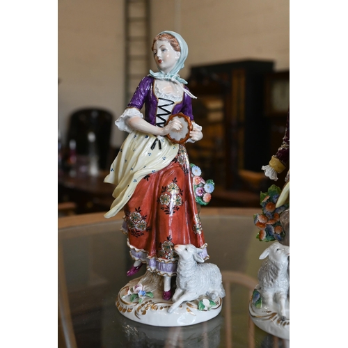 70 - A pair of Sitzendorf porcelain figures of an 18th century lady and gentleman, 17/14cm high, to/w a s... 