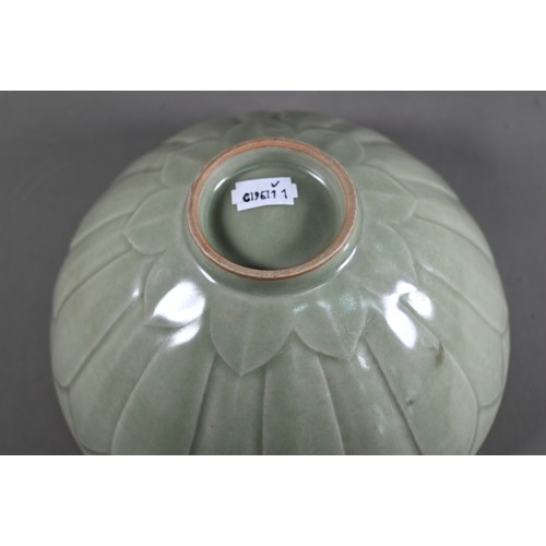 456 - A Chinese Song style celadon lotus bowl, evenly covered with an opaque sage green glaze, the interio... 