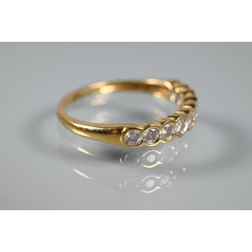 290 - A diamond set half eternity ring, the ten collet set diamonds within 18ct yellow gold band, diamonds... 