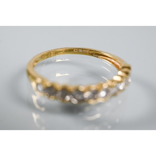 290 - A diamond set half eternity ring, the ten collet set diamonds within 18ct yellow gold band, diamonds... 