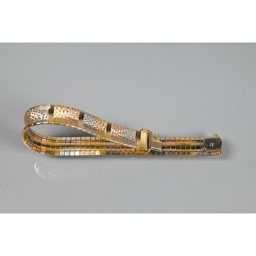 293 - A modern tri-coloured bracelet formed of etched rectangular links of yellow, white and rose metal, c... 