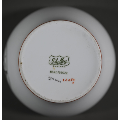 640 - An Art Deco Shelley 'Ideal China' tea service for ten, with two sandwich plates and milk and sugar p... 