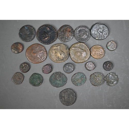 1028 - A collection of twenty three Roman and other ancient coins - not identified