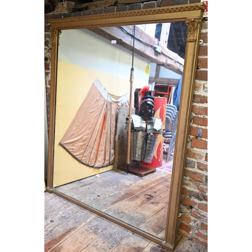 952 - A large Victorian giltwood and composite framed over-mantel mirror with original plate, 160 cm x 136... 