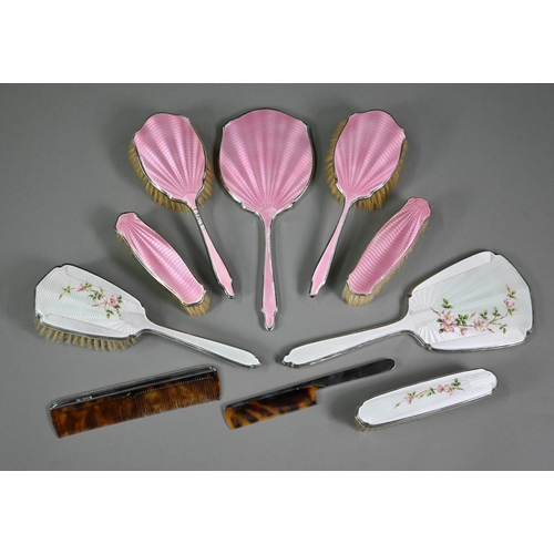 101 - A basse-taille and floral enamelled silver four-piece brush set including hand-mirror and comb (latt... 