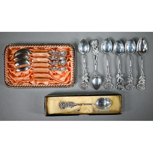 105 - A German cased set of six .830 grade coffee spoons, their stems cast with the 'Hildesheim Rose', to/... 