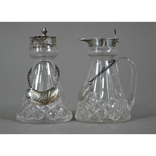 107 - A pair of cut glass conical whisky noggins with silver tops and engraved labels, S. Blackensee &... 