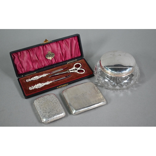 108 - Two engraved silver cigarette cases, Birmingham 1911/17, to/w a cut glass powder bowl with silver to... 