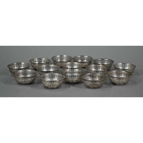 110A - A set of fourteen US Sterling small pierced bowls, 6.5cm diameter, 9.6oz