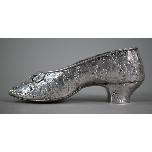 111 - A 19th Century .800 grade silver lady's slipper (possibly a novelty wine-cup or a pin cushion), embo... 