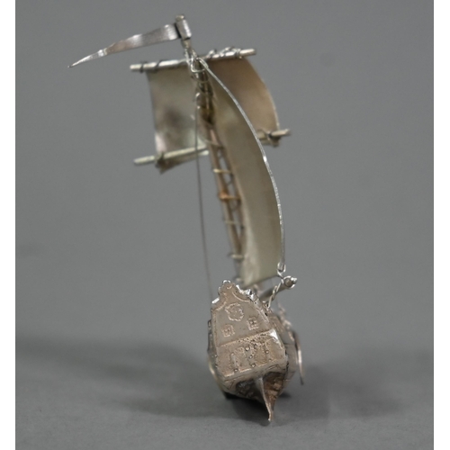 112 - A miniature silver sailing vessel in full sail, Adolph Barsach Davis, London import 1928, 8cm high, ... 