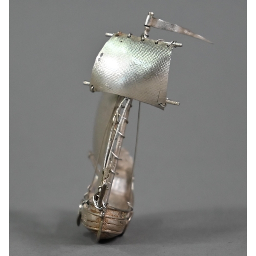 112 - A miniature silver sailing vessel in full sail, Adolph Barsach Davis, London import 1928, 8cm high, ... 