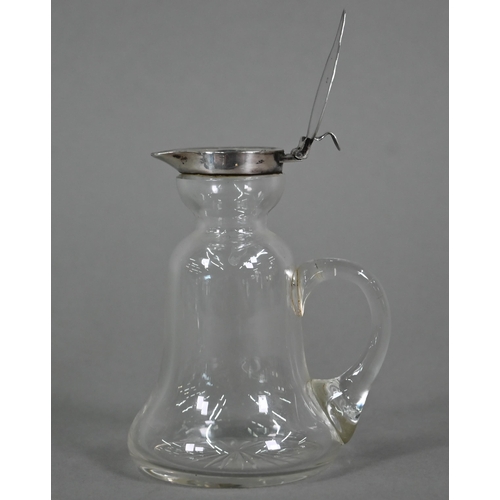 116 - A glass whisky noggin of bell-form with drawn handle and star-cut base, hinged silver top by Hukin &... 