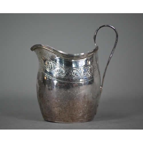 119 - A George III silver cream jug with reeded rim and strap handle and engraved decoration, Peter & ... 