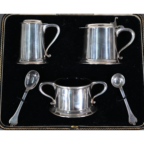 123 - A cased heavy quality silver three-piece condiment set in the form of miniature Georgian tankards, c... 