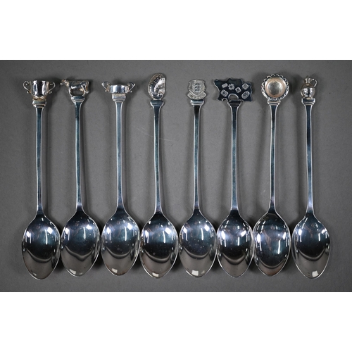 125 - Jersey interest: a cased set of eight silver souvenir teaspoons with Jersey-related finials, Martyn ... 