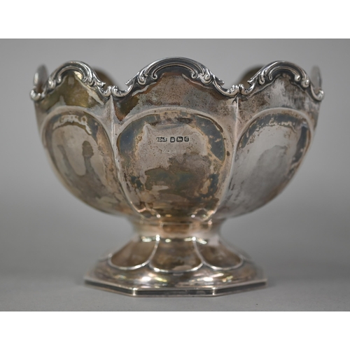 129 - An Edwardian silver rose-bowl, Sheffield 1908, 9.4oz (af), to/w an engine-turned three-piece brush s... 