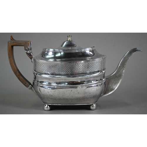 130 - A Regency silver teapot of oblong form  with diaper engraving and horn handle, on ball feet, Thomas ... 