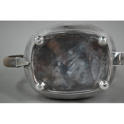 130 - A Regency silver teapot of oblong form  with diaper engraving and horn handle, on ball feet, Thomas ... 