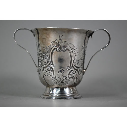 131 - A George III silver invalid's cup with floral engraving, twin reeded strap handles and moulded foot-... 