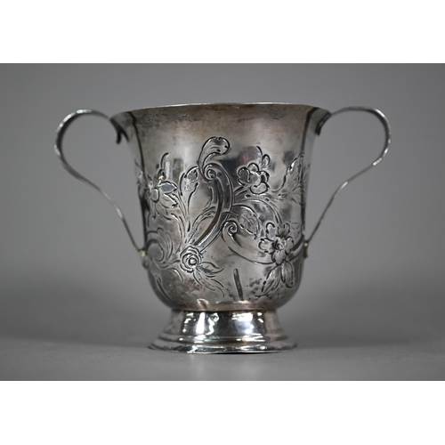 131 - A George III silver invalid's cup with floral engraving, twin reeded strap handles and moulded foot-... 