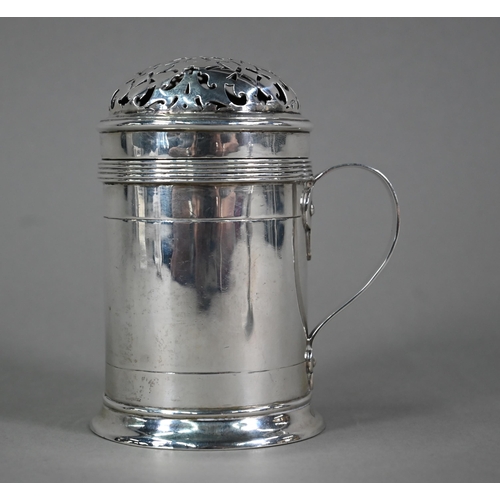 149 - An Arts & Crafts silver spice (or flour) dredger of cylindrical form with pierced domed cover an... 