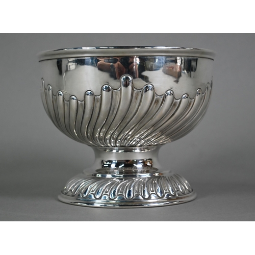 151 - A late Victorian heavy quality silver rose bowl with writhen half-reeding, on stemmed foot, William ... 