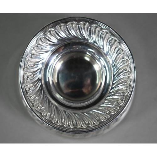 151 - A late Victorian heavy quality silver rose bowl with writhen half-reeding, on stemmed foot, William ... 