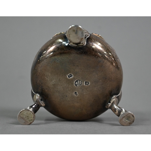 152 - A George II silver circular salt with moulded rim and three shell and hoof feet, Edward Wood, London... 