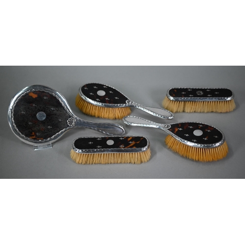 156 - A silver and tortoiseshell picquet-work five-piece brush set including hand-mirror, Levi & Salam... 