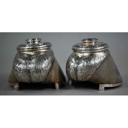 163 - A Victorian pair of silver-mounted horse's hooves, fashioned as candlesticks, engraved '