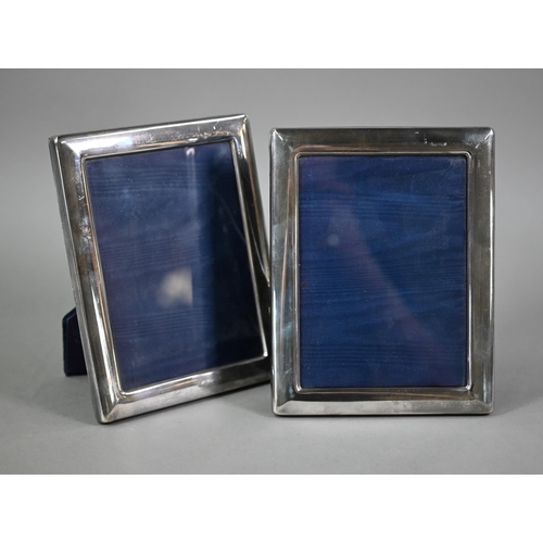 164 - A pair of silver-mounted photograph frames, Carr's, Sheffield 1998, 22 x 17.5cm